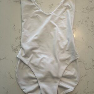 Sleek White V-Neck One-Piece Swimsuit